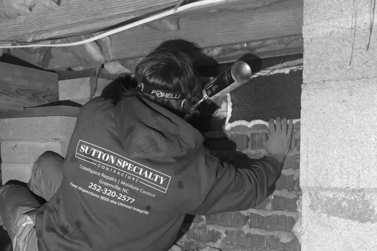 working underneath house - Choose the Right Crawlspace & Foundation Repair Company blog